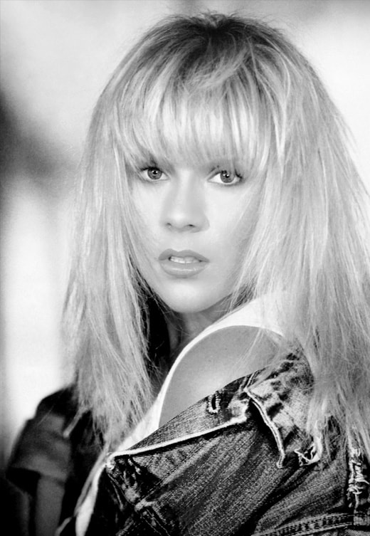 Samantha Fox is a singer – songwriter – actress – model – world famous English personality. Music was Sam’s first love and secured her first record deal aged 15, however she was whisked into the glamorous modelling world and her music career was put on hold. During the four year tenure of her extremely lucrative modelling contract, Samantha Fox literally became a household name in the UK overnight and became the nation’s darling. She gave up modelling aged 20 to concentrate on her music and released her first single in 1986, ‘Touch Me’ reached No 3 in the UK and No 4 in the USA. The single went on to amass a formidable array of Platinum, Gold and Silver awards and 24 discs honour these sales. Follow up ‘Do Ya Do Ya (Wanna Please Me)’ reached No. 10. The ‘Touch Me’ album and three others found Number One national chart positions in no less than 15 countries and Top 5’s in numerous others including the USA. She has sold over 30 million records worldwide.
During the 80’s Sam was the most photographed British star, alongside Princess Diana and Margaret Thatcher. Not since the Beatles has a British personality been so well known all over the world, across a complete cross section of age, sex, race and religion. Sam toured the world, barely stopping for breath and made a terrific impact with her live act, selling out halls of up to 30,000 capacities across Canada and America and touring Malaysia, Taiwan, Singapore and Korea. In Montreal she broke the box office record. In South America she had huge record sales and a sell out tour sponsored by Pepsi - 20,000 seat minimum. In one year alone Sam played to over a million fans. Another year was spent in New York, VJ’ing for MTV (presenting pop promo video programmes on Music Television), acting in a sitcom and recording with top US producers.